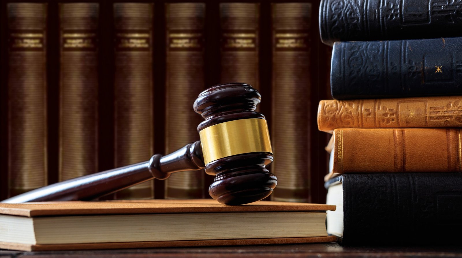 judge-gavel-on-a-book-law-books-background-wooden-desk.jpg